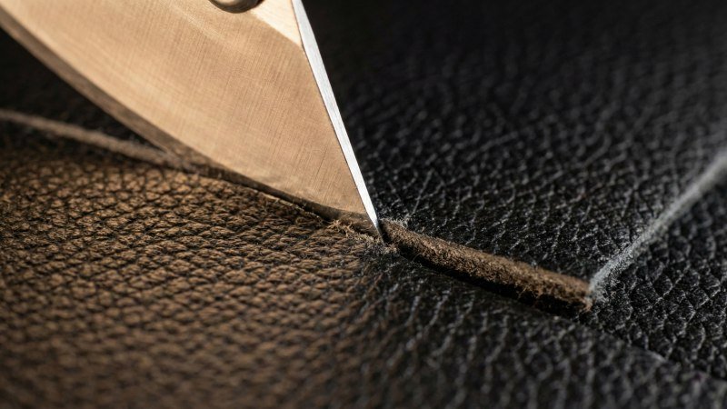Close Up Of Oscillating Knife Cutting Leather Without Burning